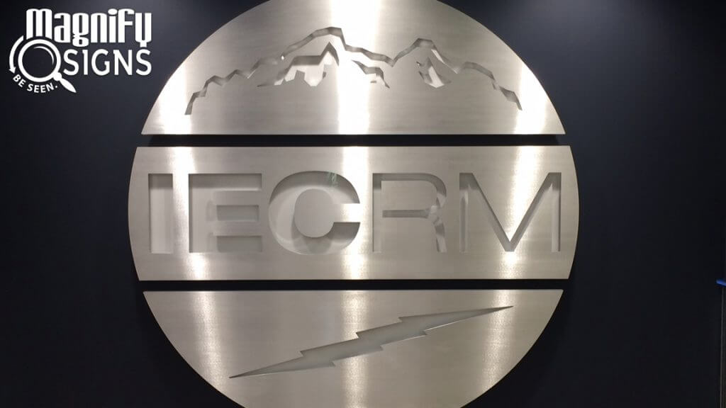 Aluminum custom routed Lobby Sign for IEC-RM in Northglenn, CO