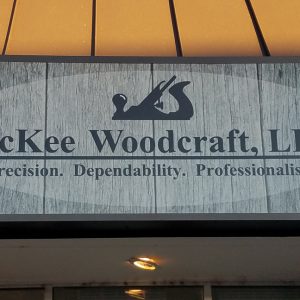 Light Cabinet Sign installed above Mckee Woodcraft in Englewood, CO