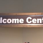 Foyer Sign with an Aluminum Panel inbetween Wooden Clamps for The Rock Church in Littleton, CO